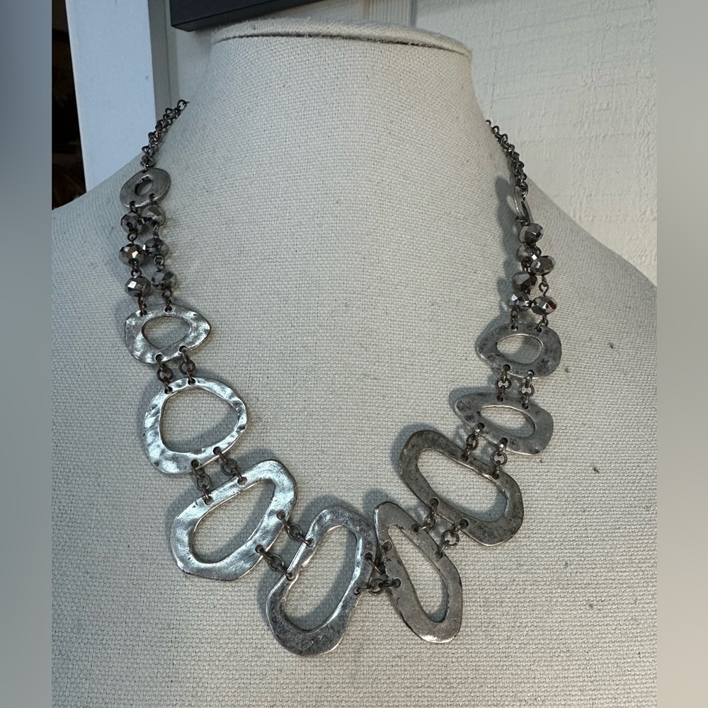 Hammered silvertone artisan vibe meets industrial necklace